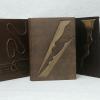 Different guestbooks with wood inlays
